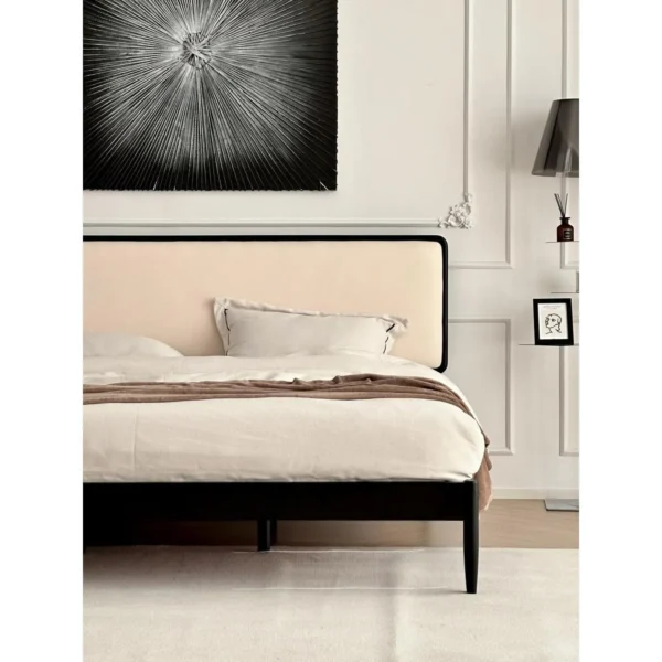 Jianxu Slim Black-Frame Bed with Linen Headboard in black — in a room setting