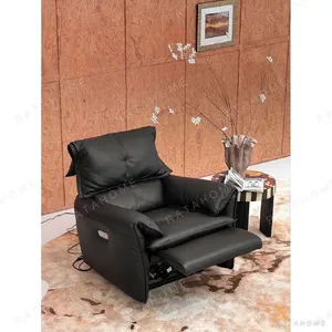 Matte Black Leather Electric Recliner with Rocking and USB in black — in a room setting