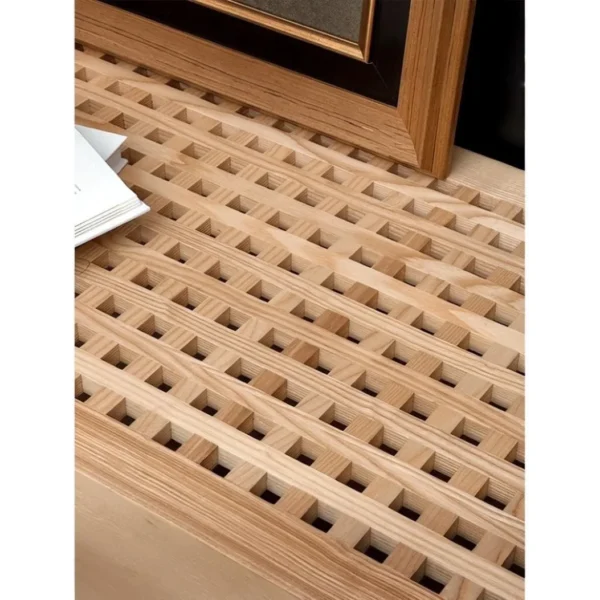 Ocean V-Form Wood Console with Perforated Top in natural oak — in a room setting