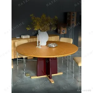 Shiqiu Round Oak Dining Table on Crimson Cross Base in natural oak — in a room setting