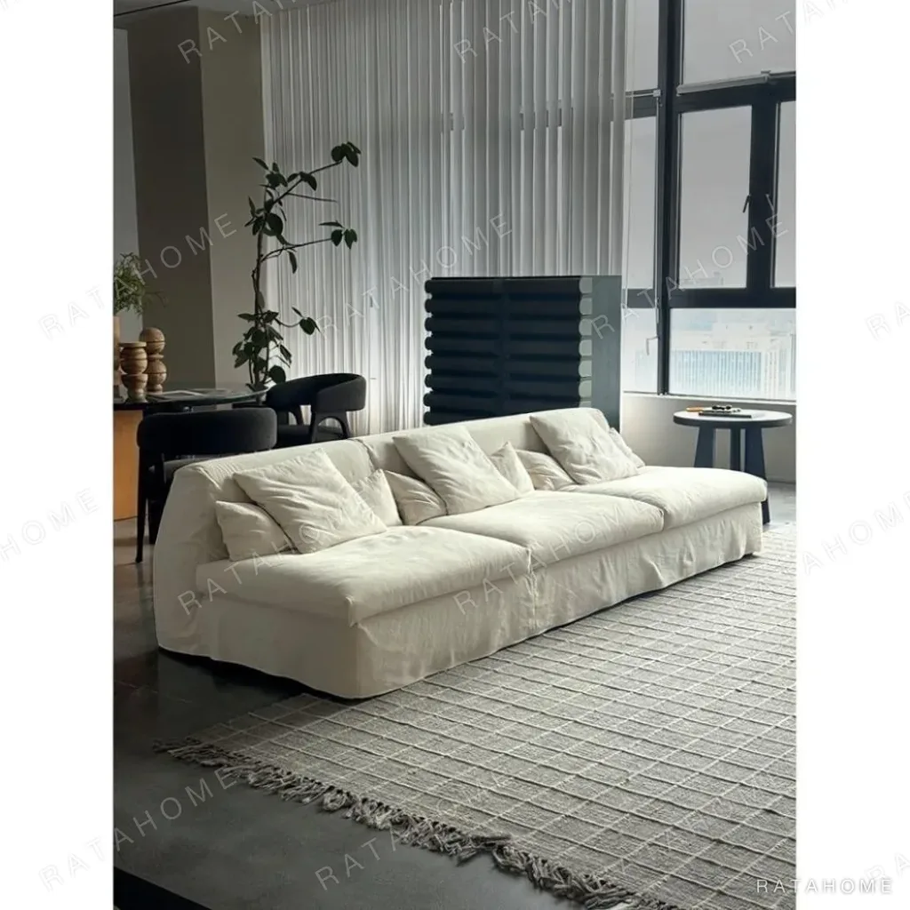Skirt Sofa in White Linen with Removable Draped Cover — in a room setting