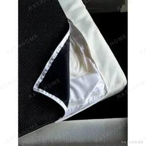 Skirt Sofa in White Linen with Removable Draped Cover — in a room setting