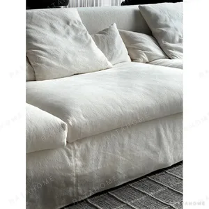 Skirt Sofa in White Linen with Removable Draped Cover — in a room setting