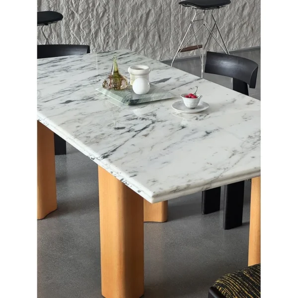 Spruce Cloud Marble Dining Table on Ash Posts in ivory — in a room setting