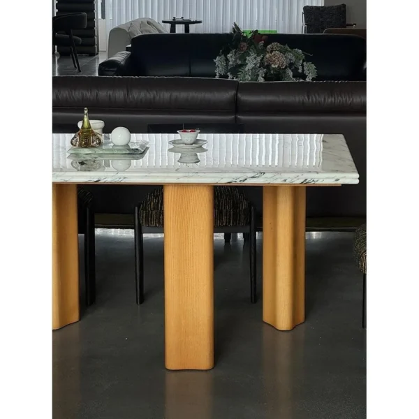 Spruce Cloud Marble Dining Table on Ash Posts in ivory — in a room setting