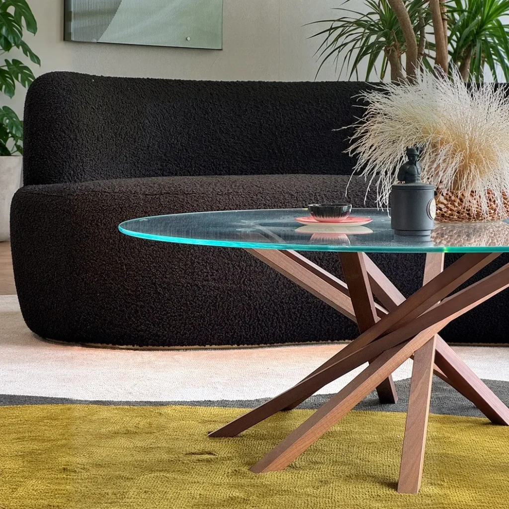 Star Round Glass Coffee Table on Splayed Wood Base, 100 cm in clay — front view