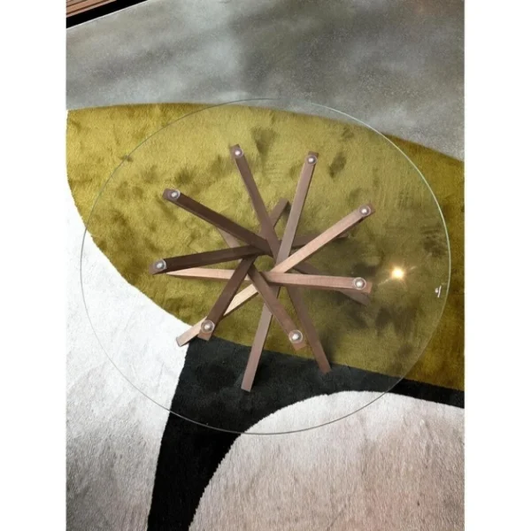 Star Round Glass Coffee Table on Splayed Wood Base, 100 cm in clay — in a room setting