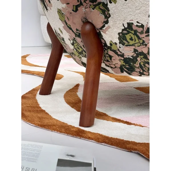 Woolf Rose Jacquard Lounge Chair with Pink Velvet Seat in rose stone — in a room setting