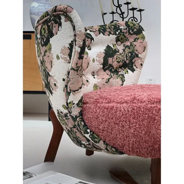 Woolf Rose Jacquard Lounge Chair with Pink Velvet Seat in rose stone — in a room setting