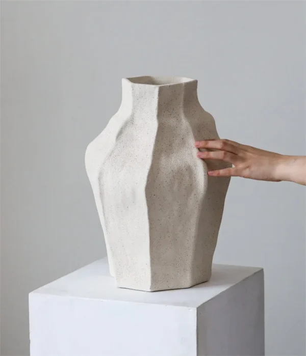 Jingdezhen Faceted Sand-Texture Art Vessel, Short or Tall in ivory — in a room setting