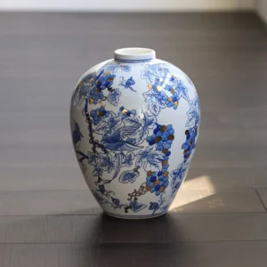 Hand-Painted Blue and White Grape and Bird Jar Vase in blue — front view