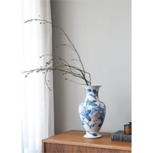 Hand-Painted Blue and White Pomegranate Fishtail Vase in blue — in a room setting
