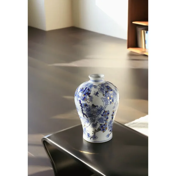 Hand-Painted Blue and White Grape and Bird Plum Vase in blue — in a room setting
