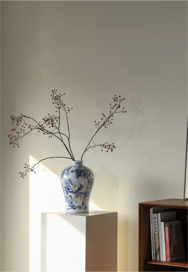 Hand-Painted Blue and White Grape and Bird Plum Vase in blue — in a room setting
