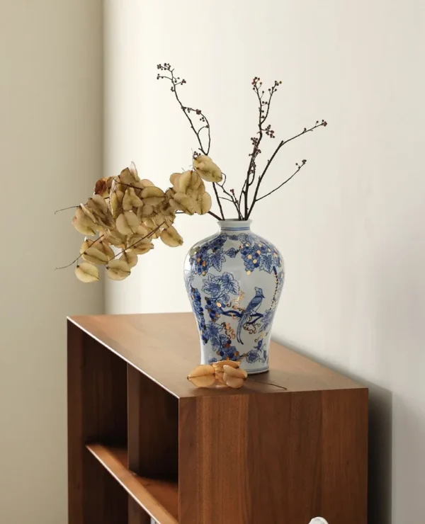 Hand-Painted Blue and White Grape and Bird Plum Vase in blue — in a room setting