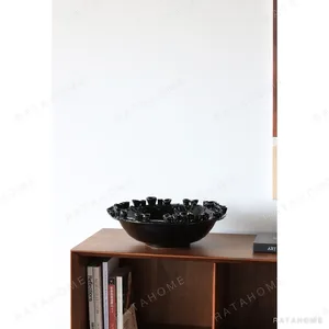 Jingdezhen Ceramic Bowl with Crenellated Rim, White or Black in ivory — in a room setting