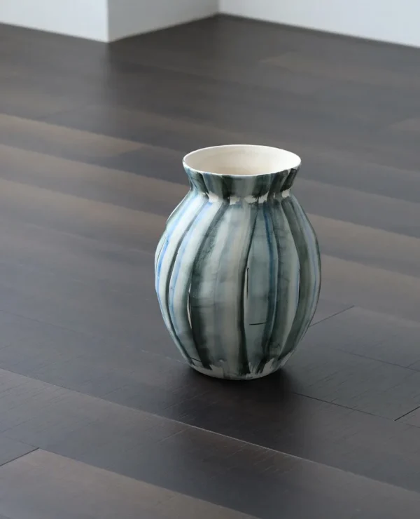 Jingdezhen Mixed-Colour Striped Ribbed Vase, Two Forms in blue — in a room setting