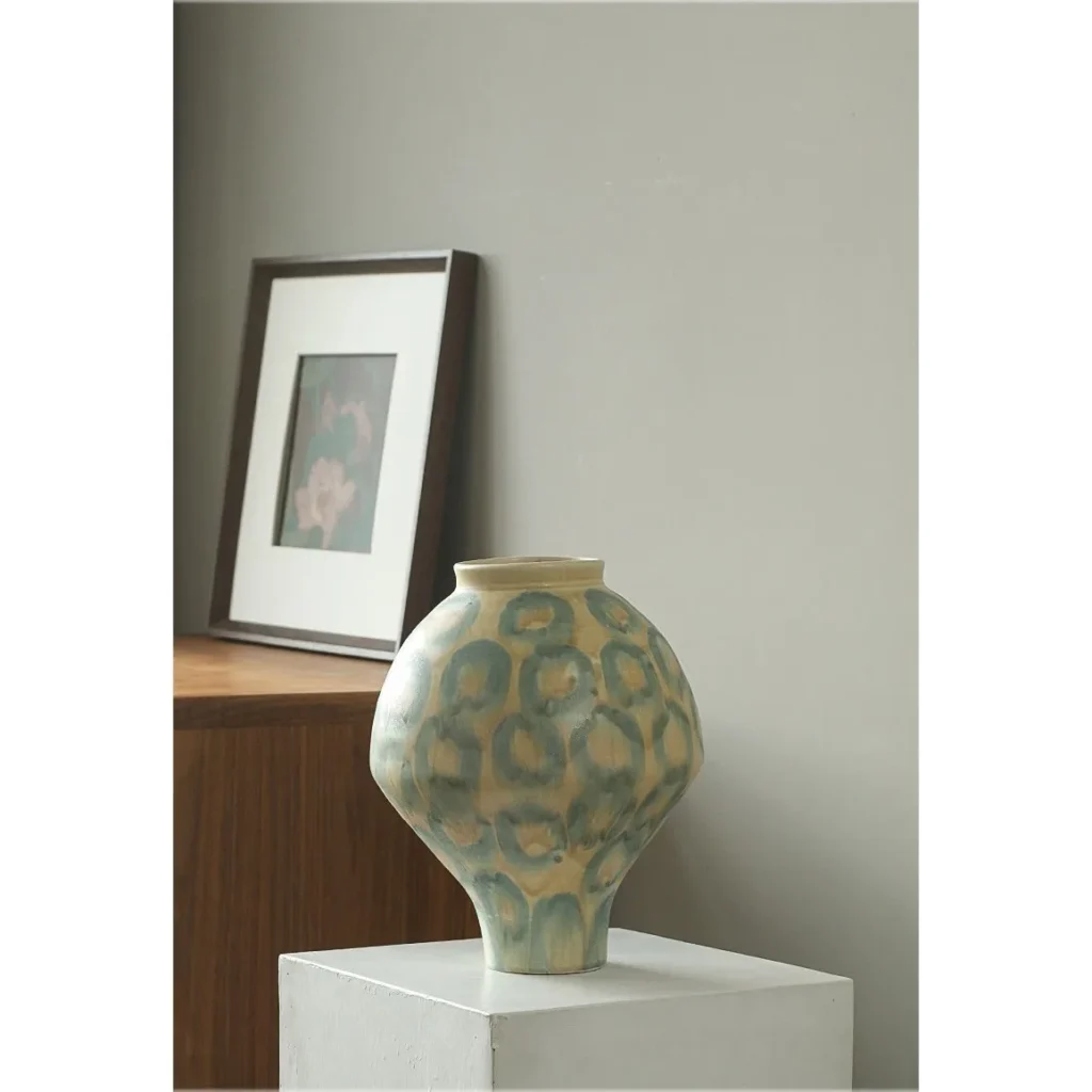 Jingdezhen Celadon Circle Pattern Round Jar Vase, Large in olive — in a room setting