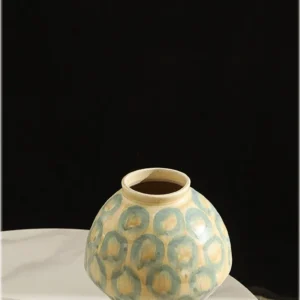 Jingdezhen Celadon Circle Pattern Round Jar Vase, Large in olive — in a room setting