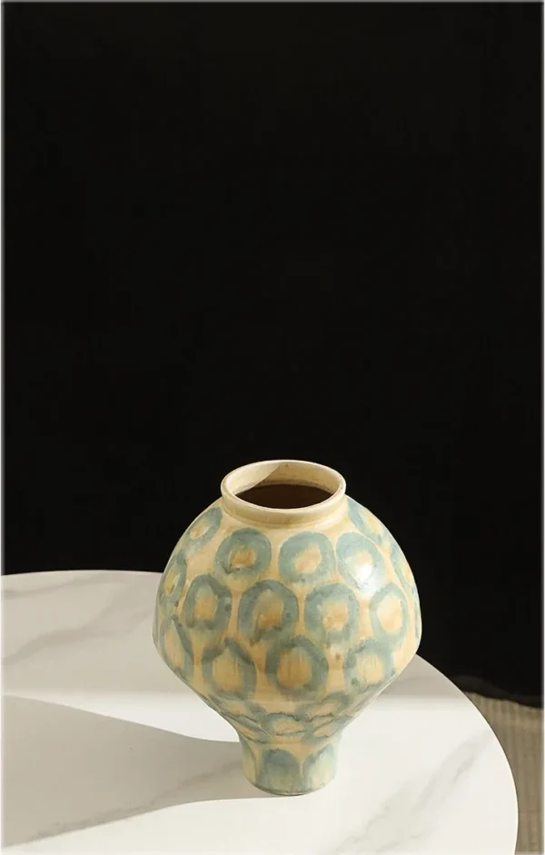 Jingdezhen Celadon Circle Pattern Round Jar Vase, Large in olive — in a room setting