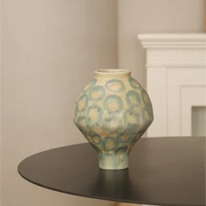 Jingdezhen Celadon Circle Pattern Round Jar Vase, Large in olive — in a room setting