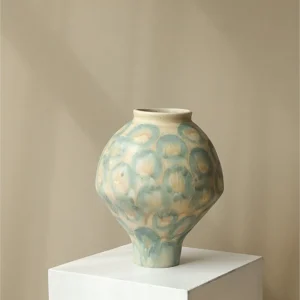 Jingdezhen Celadon Circle Pattern Round Jar Vase, Large in olive — in a room setting