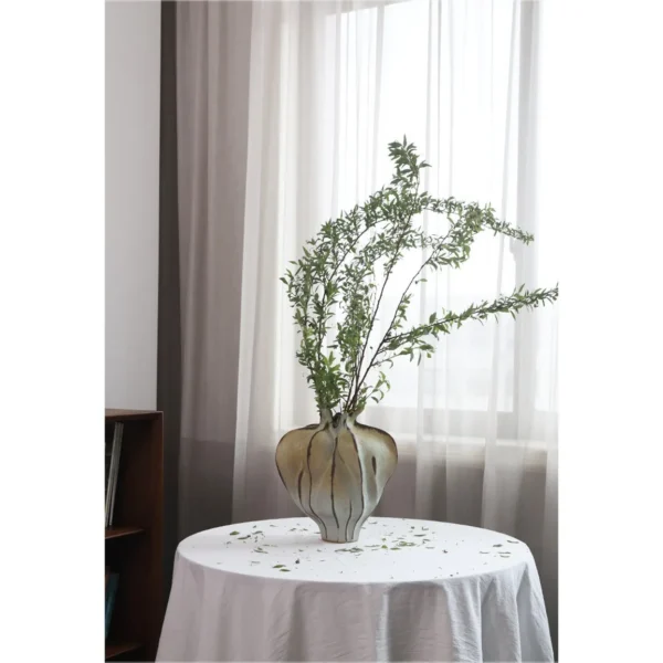 Jingdezhen Mountain and Water Lobed Art Vase, Large in olive — in a room setting