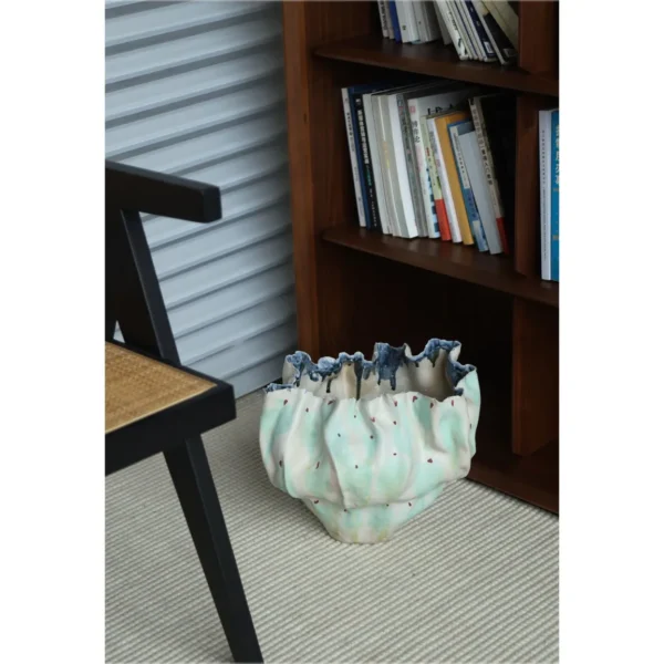 Jingdezhen Hand-Built Folded Wide-Mouth Floor Vase, Large in olive — in a room setting