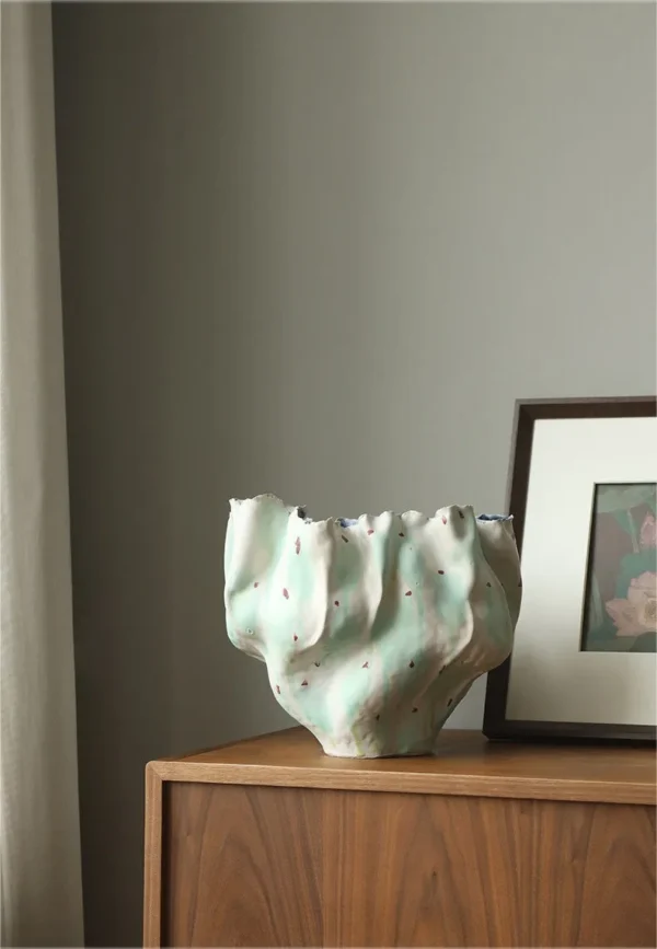 Jingdezhen Hand-Built Folded Wide-Mouth Floor Vase, Large in olive — in a room setting