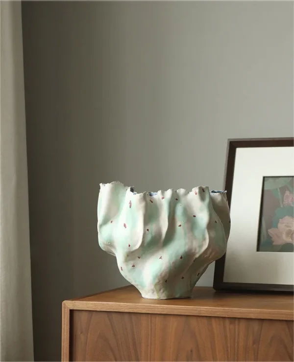 Jingdezhen Hand-Built Folded Wide-Mouth Floor Vase, Large in olive — in a room setting