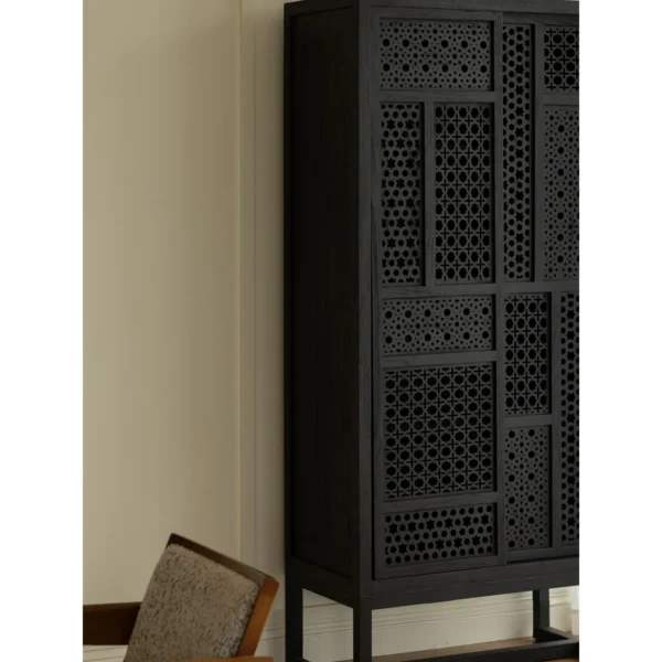 Jixing Teak Tall Cabinet with Pierced Star Sliding Doors in black — in a room setting