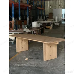 Josei White Oak Plank Dining Table with Butterfly Joints in natural oak — in a room setting