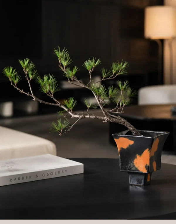 Kiln-Change Splash Glaze Square Stoneware Vase in black — in a room setting