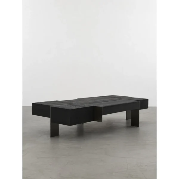 Kitale Black Oak Block Coffee Table with Black Metal Base in black — in a room setting