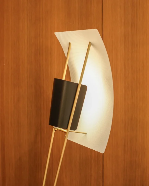 Kite Sculptural Floor Lamp with Perforated Curved Shade in brushed brass — detail