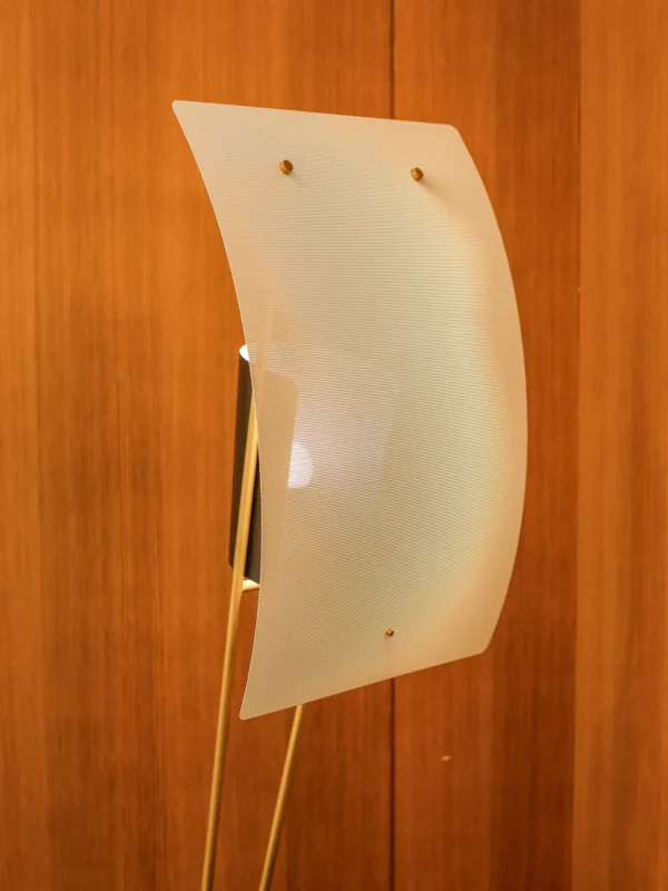 Kite Sculptural Floor Lamp with Perforated Curved Shade in brushed brass — detail