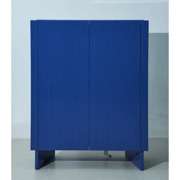 Klein Blue Fluted Lacquered Tall Cabinet in blue — in a room setting