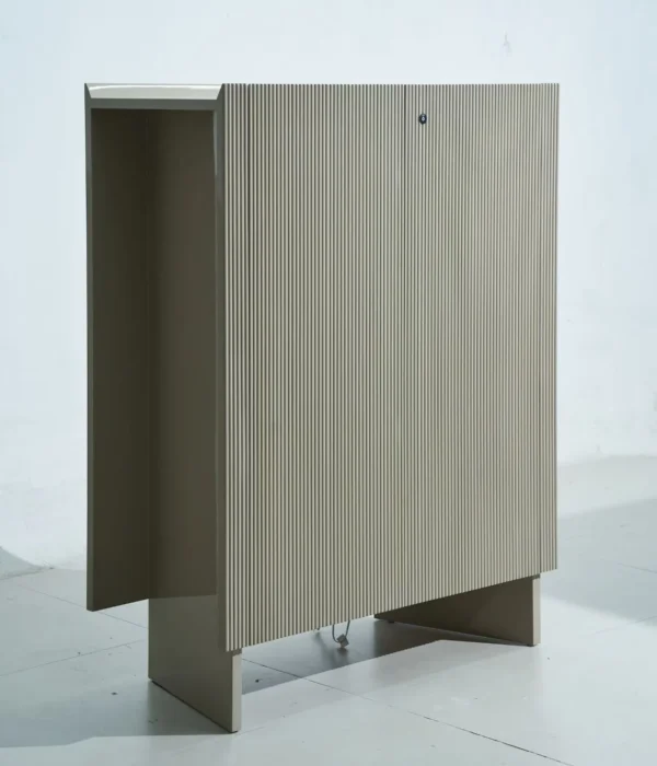 Klein Blue Fluted Lacquered Tall Cabinet in blue — in a room setting