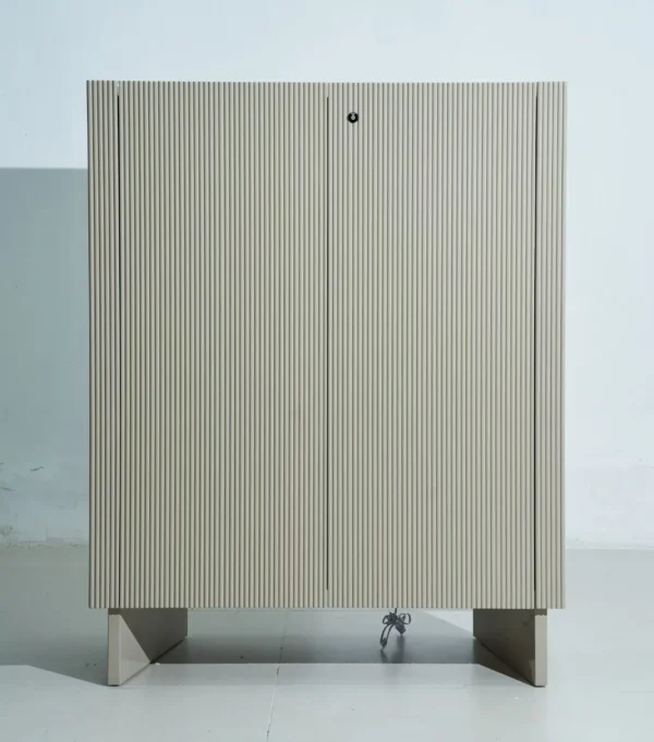Klein Blue Fluted Lacquered Tall Cabinet in blue — in a room setting