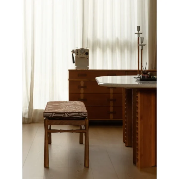 Labyrinth Ash Bench with Removable Maze Chenille Cushion in walnut — in a room setting