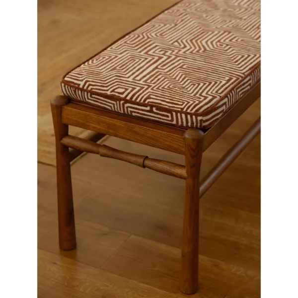 Labyrinth Ash Bench with Removable Maze Chenille Cushion in walnut — in a room setting