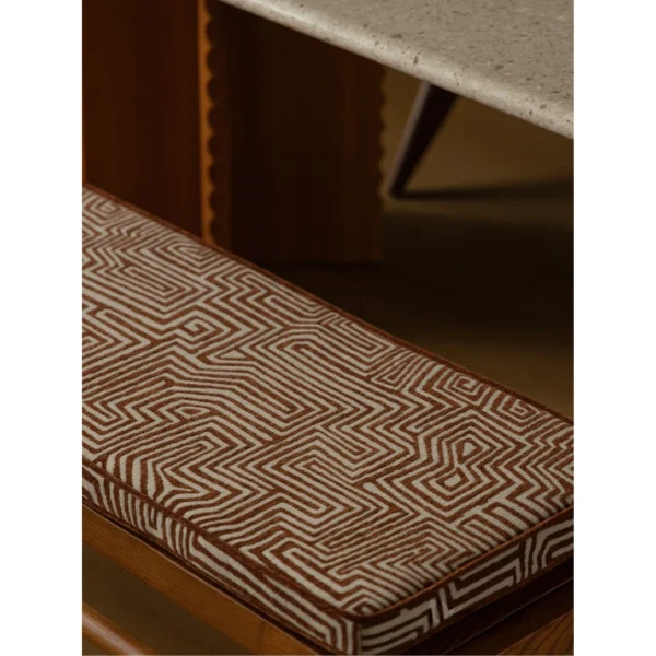 Labyrinth Ash Bench with Removable Maze Chenille Cushion in walnut — in a room setting
