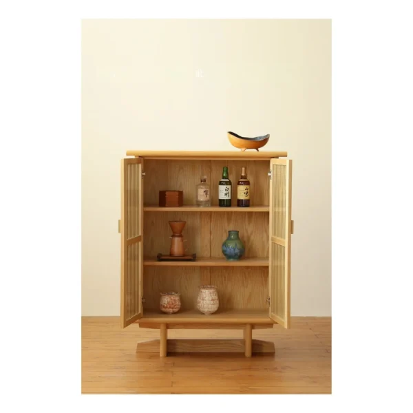 Lan Solid Wood Slatted Bar Cabinet for Whisky and Cigars in natural oak — in a room setting