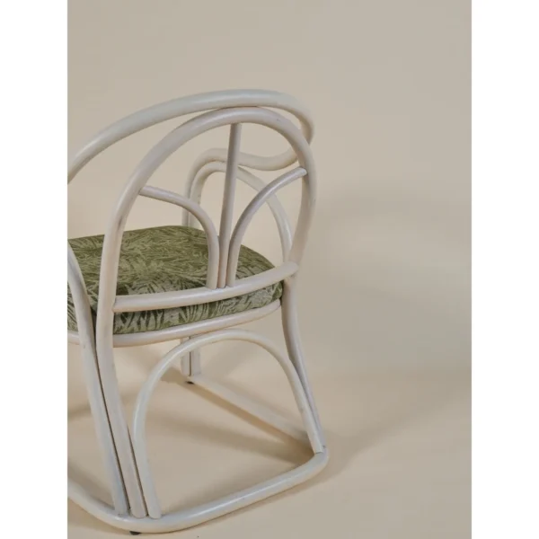 Lanxu Ivory Rattan Armchair with Green Leaf Jacquard Cushion in oatmeal — in a room setting