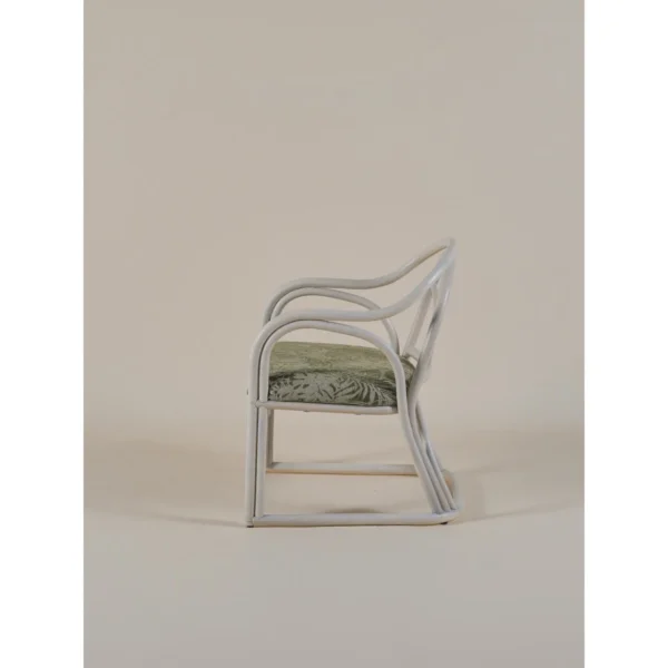 Lanxu Ivory Rattan Armchair with Green Leaf Jacquard Cushion in oatmeal — in a room setting