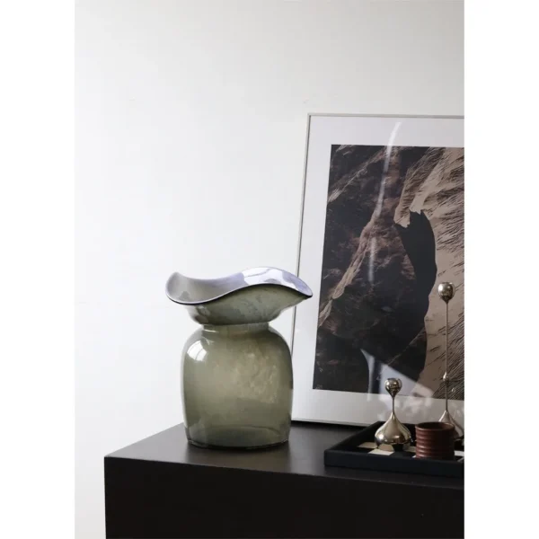 Hand-Blown Pink Marbled Glass Bowl with Wavy Rim in rose stone — in a room setting