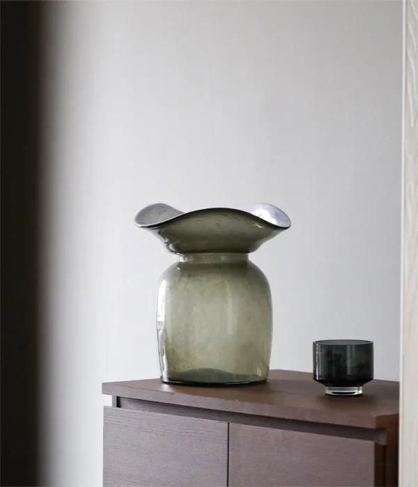 Hand-Blown Pink Marbled Glass Bowl with Wavy Rim in rose stone — in a room setting