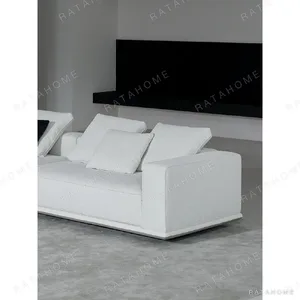 Skyline Modular Sofa in Cream Fabric on Low Floating Base — in a room setting