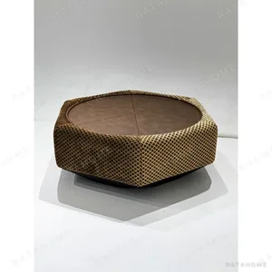Hexagonal Leather and Plaid Fabric Coffee Table in clay — in a room setting