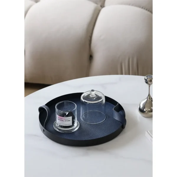 Round Leather Catch-All Tray with Strap, Navy, Green or Grey in blue — in a room setting